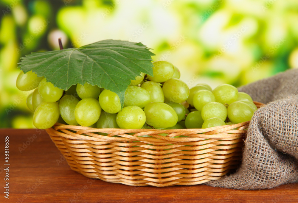 Ripe delicious grapes in wicker basket Ripe delicious grapes in wicker basket