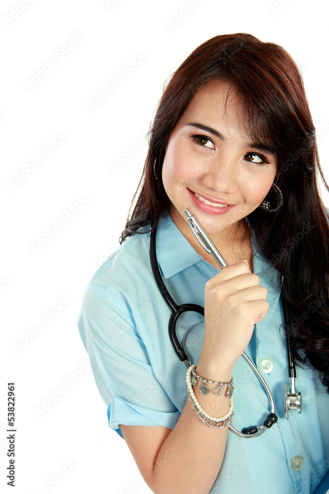 Happy young nurse with stethoscope and thinking Happy young nurse with stethoscope and thinking