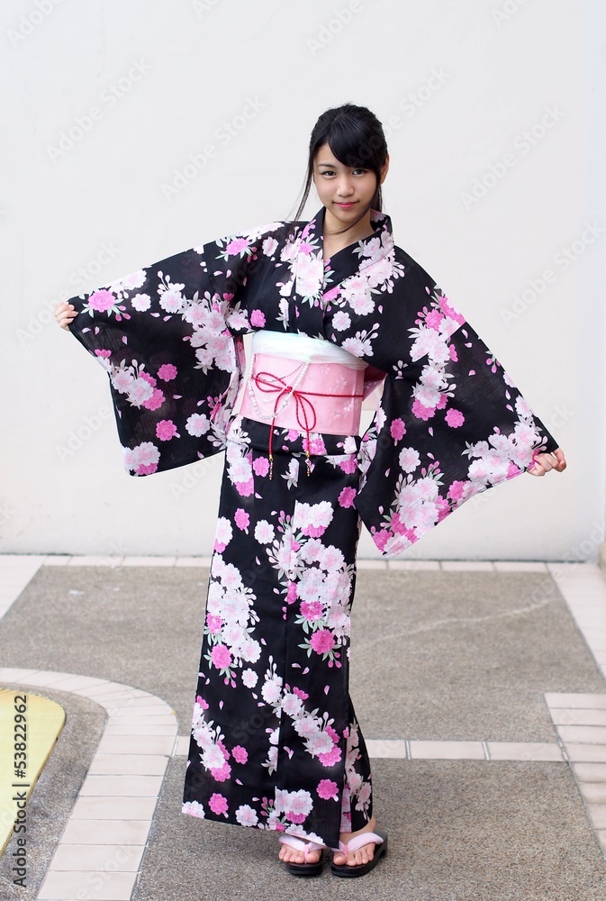 Pretty young woman wearing Japanese kimono
