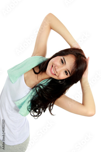 Happy young woman doing exercise