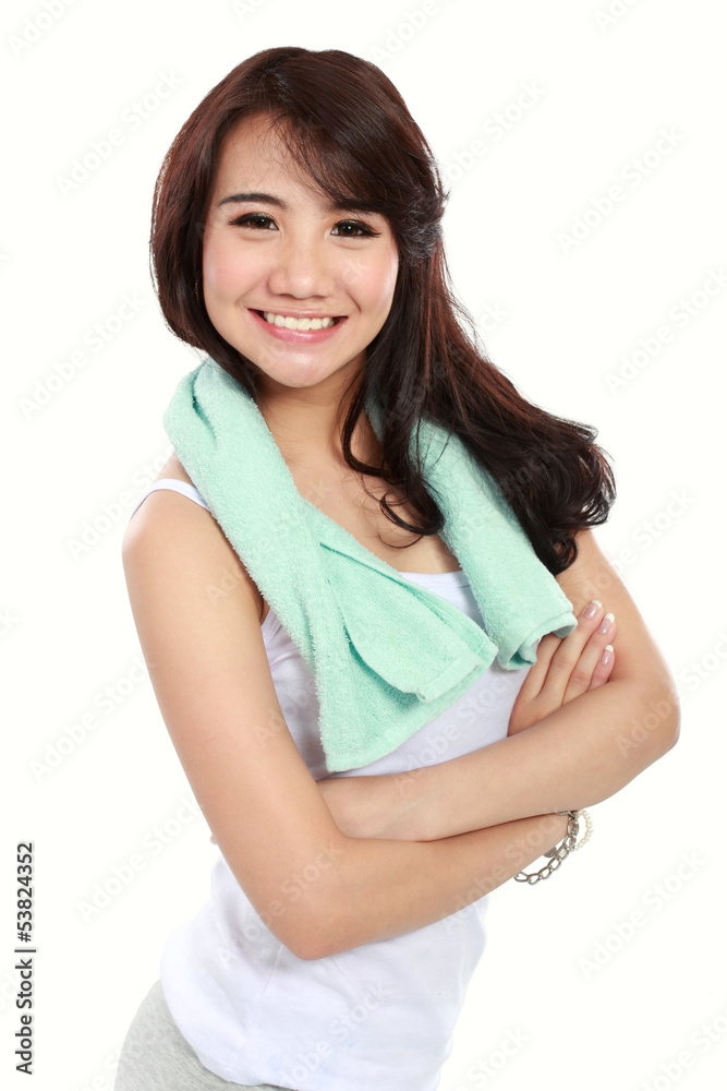 Smiling happy asian woman fitness model with arms crossed Smiling happy asian woman fitness model with arms crossed