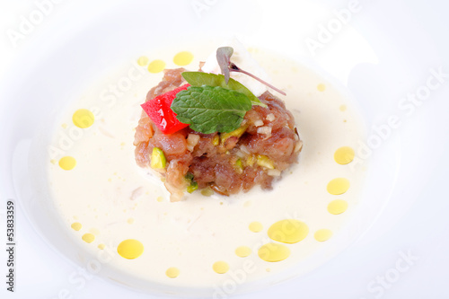 Fresh Tuna tartare served in coconut sauce