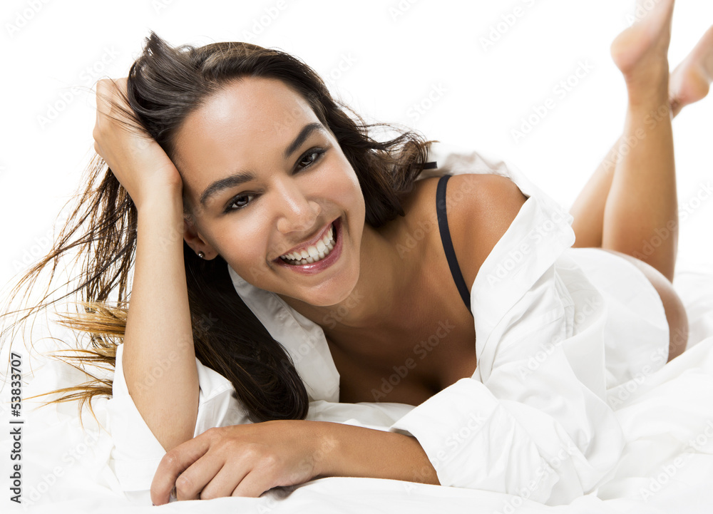 Sexy woman lying on the bed Sexy woman lying on the bed