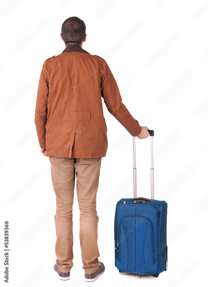 Back view of stylishly dressed man in a brown jackett with suit Back view of stylishly dressed man in a brown jackett with suit