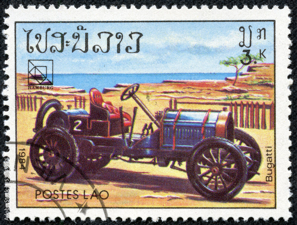 stamp printed in Laos showing vintage car