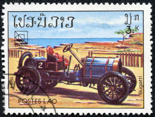 stamp printed in Laos showing vintage car