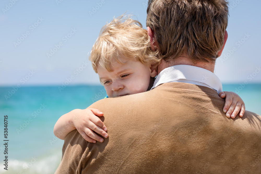 Portrait of mother and her little son on the beach Portrait of mother and her little son on the beach