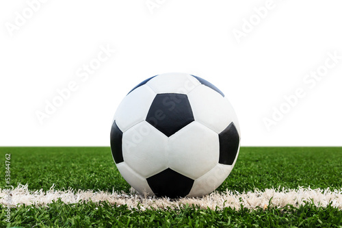 soccer ball on green grass field isolated