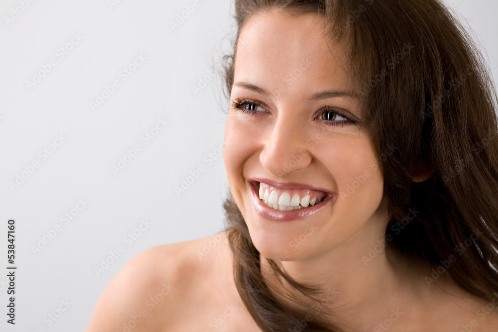 Smiling Girl with hair blowing in the air Smiling Girl with hair blowing in the air
