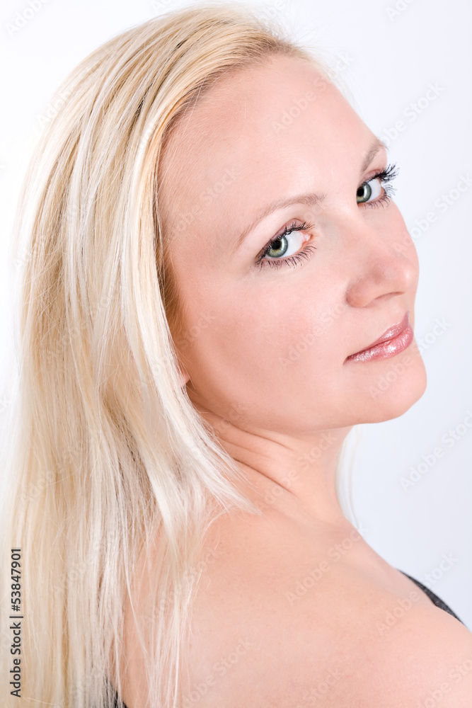 Close-up face of beautiful blonde woman with green eyes Close-up face of beautiful blonde woman with green eyes