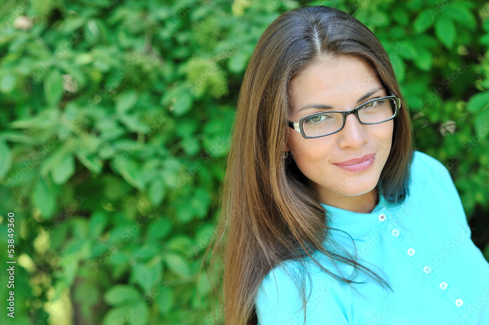 Beautiful woman face wearing glasses - closeup Beautiful woman face wearing glasses - closeup