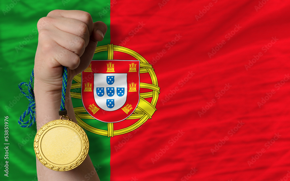 Gold medal for sport and  national flag of portugal
