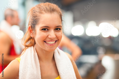 Girl smiling in a fitness club