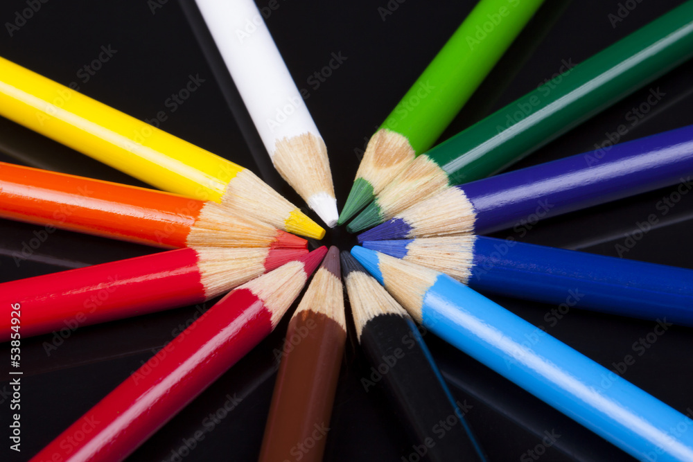 Fototapeta premium Color pencils isolated on black background