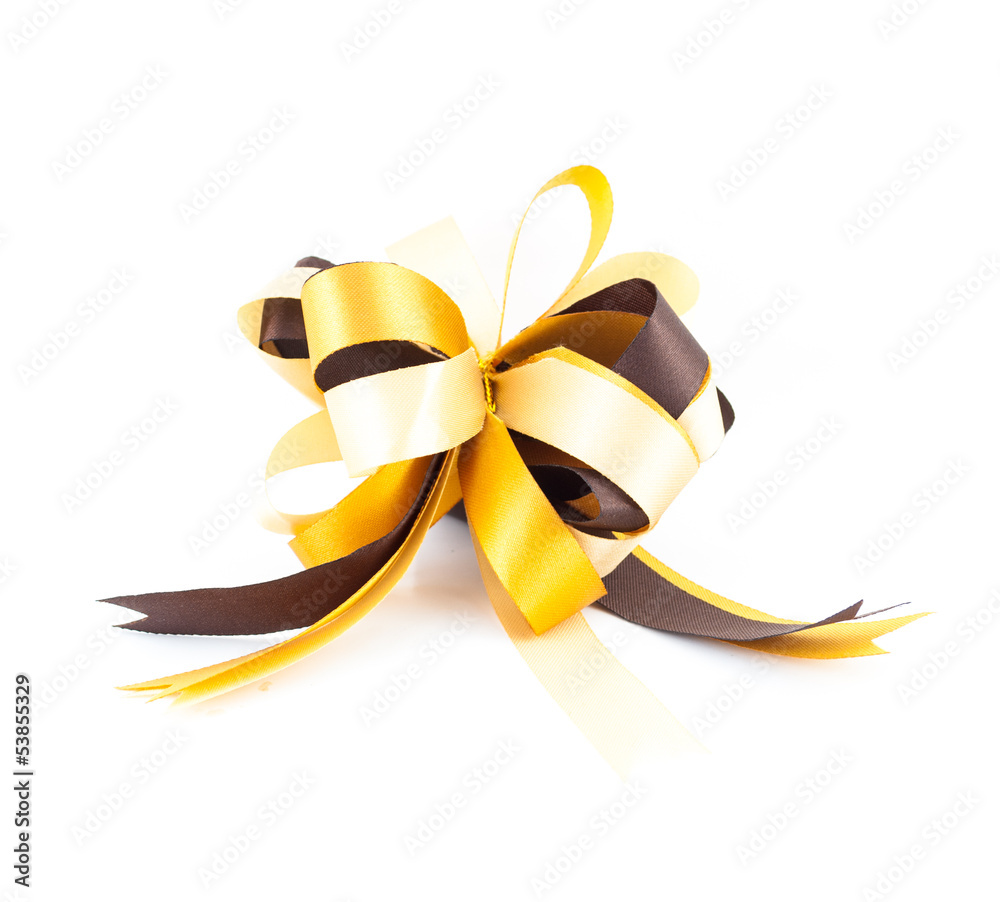 golden or yellow ribbon bow isolated on white background golden or yellow ribbon bow isolated on white background