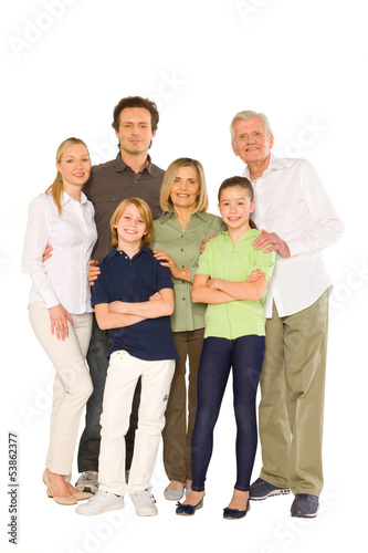 Bild auf Leinwand three generations family standing isolated on white background