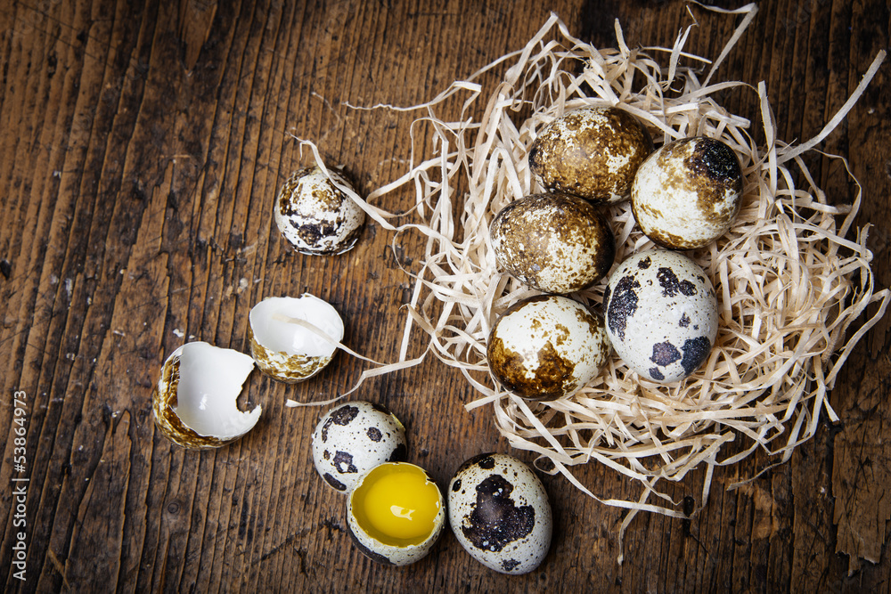 fresh quail eggs on an old wooden table fresh quail eggs on an old wooden table