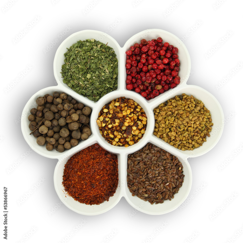 White porcelain bowl with spices isolated on white background