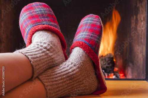 relaxing at the fireplace on winter evening