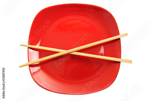 Red plate with chinese sticks