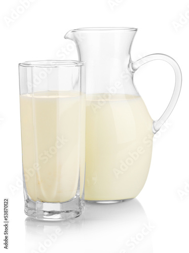 Milk in jug and glass isolated on white