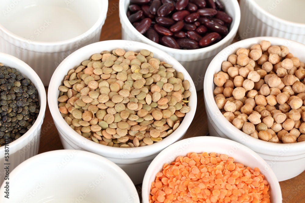 Bowls with different kinds of lentil, beans and chickpea. Bowls with different kinds of lentil, beans and chickpea.