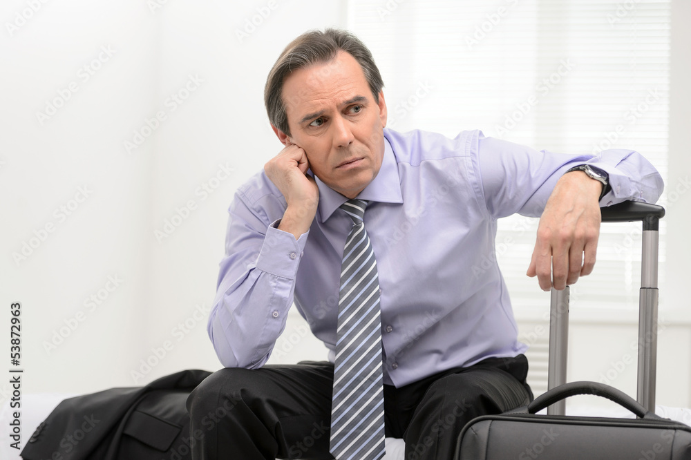 Tired of traveling. Portrait of a thoughtful senior businessman Tired of traveling. Portrait of a thoughtful senior businessman