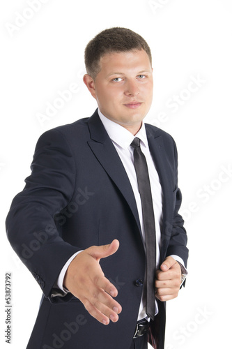 young business man offering you a handshake