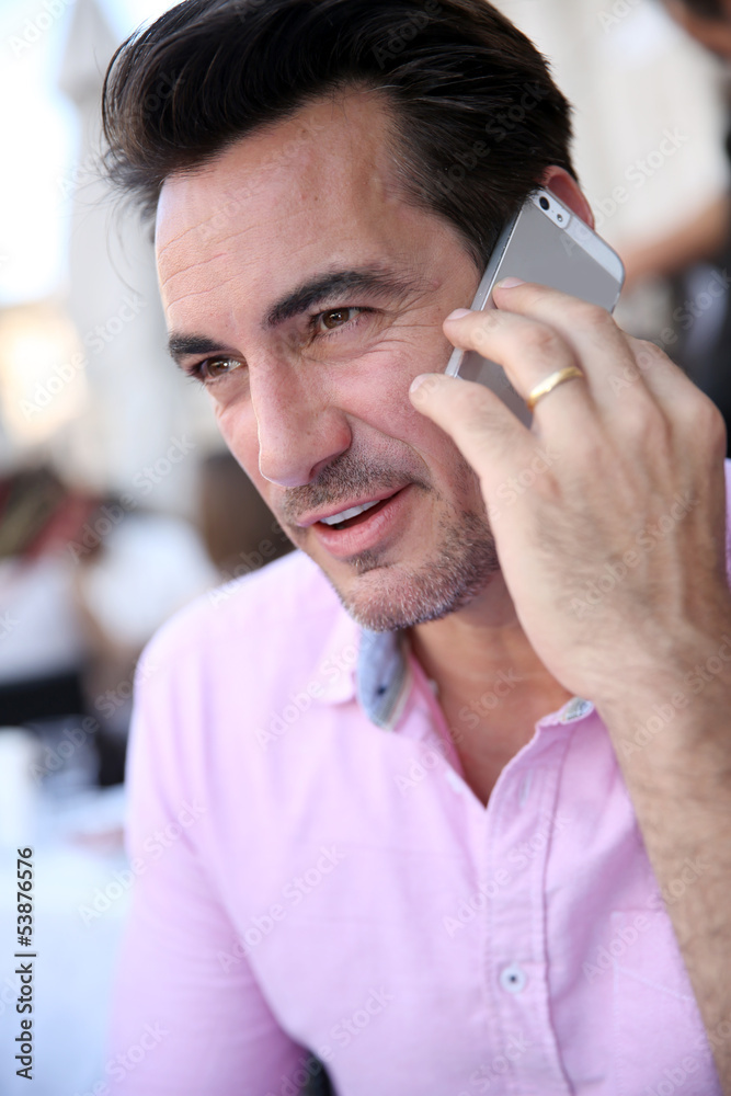 Portrait of mature man using smartphone Portrait of mature man using smartphone