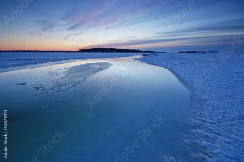 Early winter morning icescape before sunrise