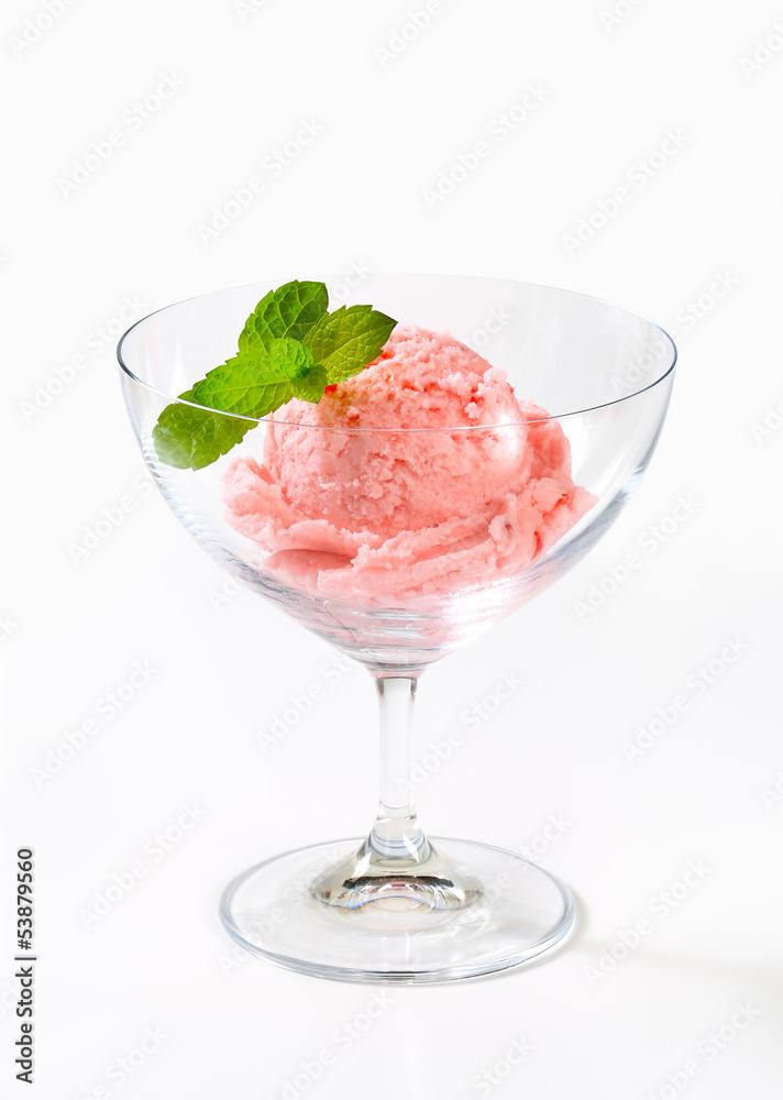 Fruit-flavored ice cream in a coupe Fruit-flavored ice cream in a coupe
