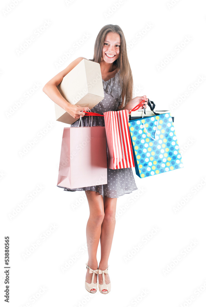 Young woman with shopping bags isolated white background Young woman with shopping bags isolated white background