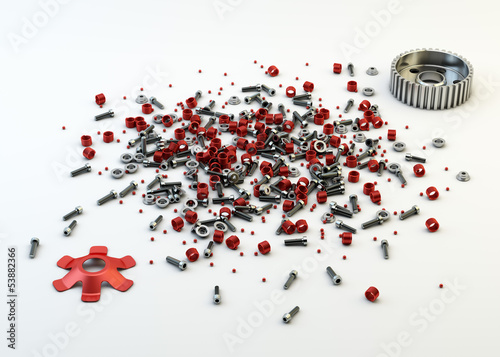 Pile of nuts and bolts from disassembled clutch isolated on whit photo