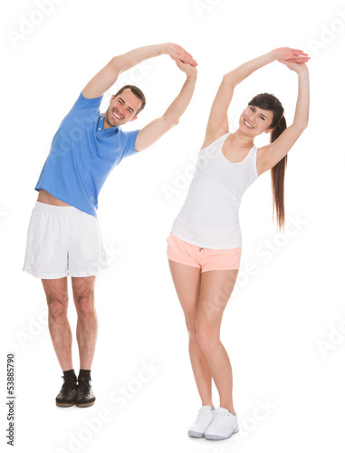 Portrait Of Couple Exercising