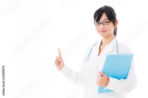 attractive asian doctor showing on white background