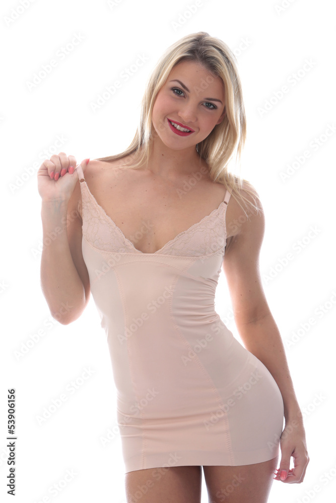 Attractive Sexy Young Woman Posing in Short Tight Mini Dress Attractive Sexy Young Woman Posing in Short Tight Mini Dress