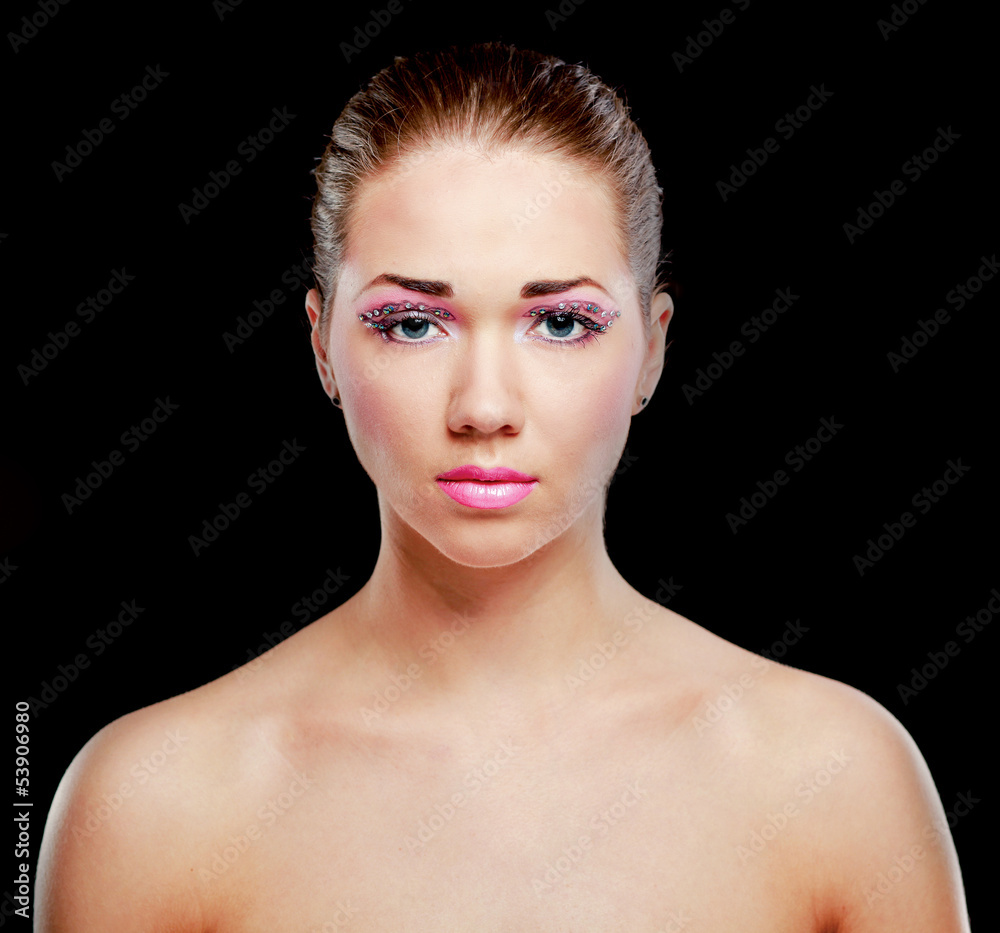 Woman with exotic style makeup, isolated on black background Woman with exotic style makeup, isolated on black background