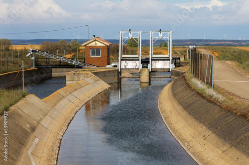 Compuertas en canal de riego photo