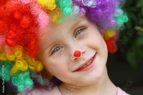 Smiling Child in Clown Costume