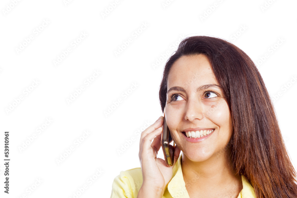 Close-up portrait of a young beautiful woman talking on the phon Close-up portrait of a young beautiful woman talking on the phon