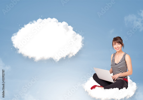 Young girl sitting on cloud and thinking of abstract speech bubb photo