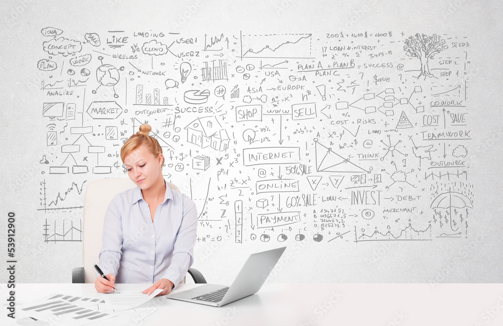Pretty businesswoman planning and calculating various business i Pretty businesswoman planning and calculating various business i