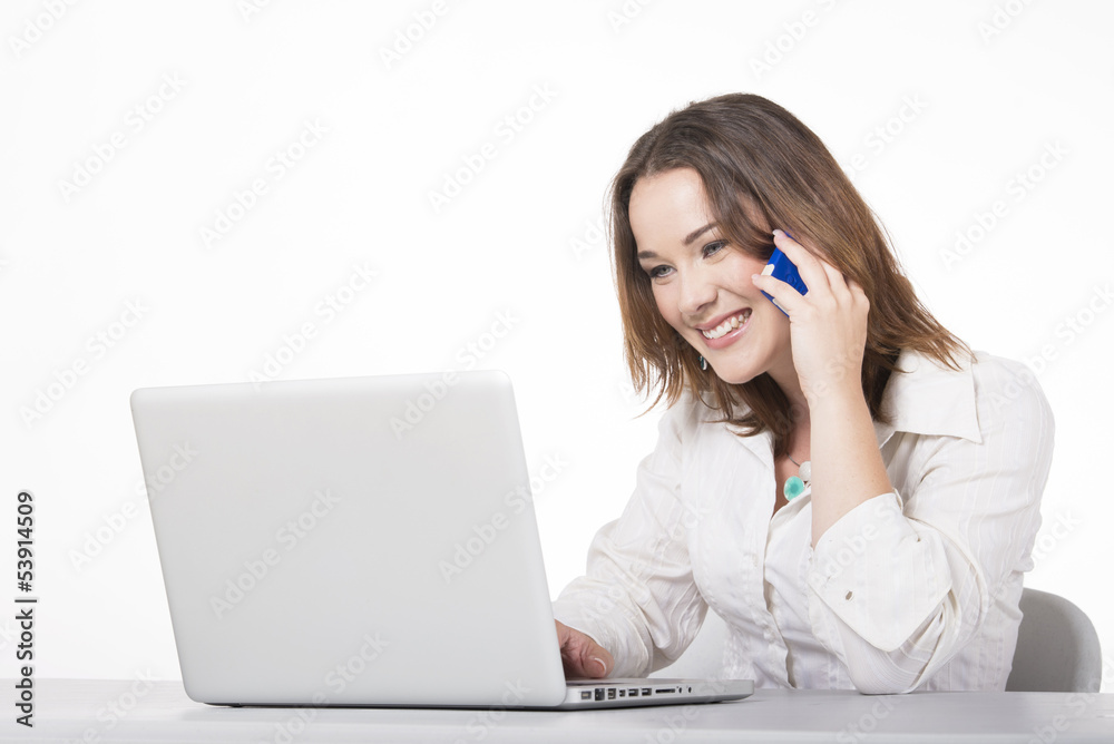 A beautiful young business woman at work A beautiful young business woman at work