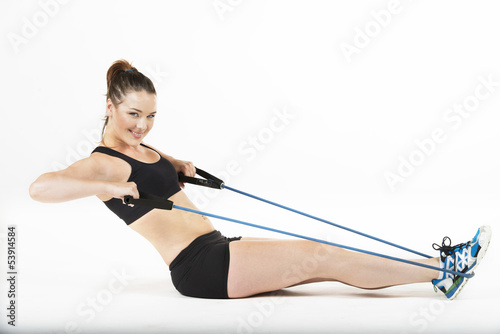A beautiful young woman working out