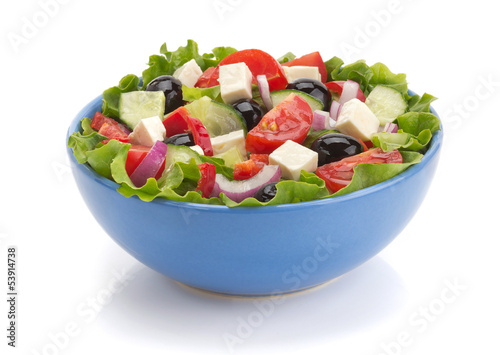 salad in bowl on white