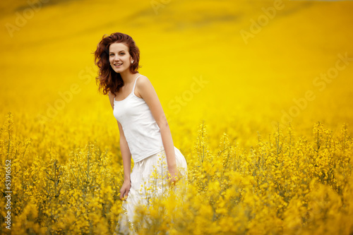 young beautiful girl in the field © Aliaksei Lasevich