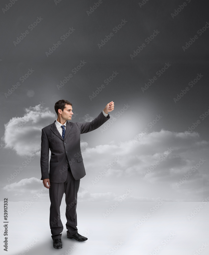 Businessman holding out his arm Businessman holding out his arm