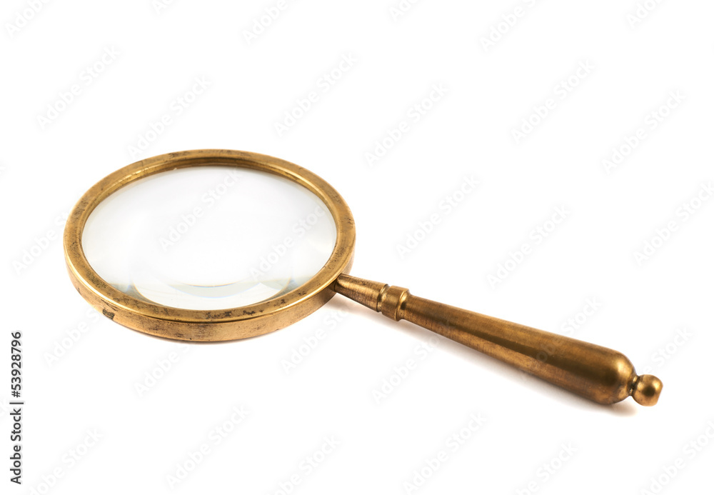 Old metal magnifying glass isolated Old metal magnifying glass isolated