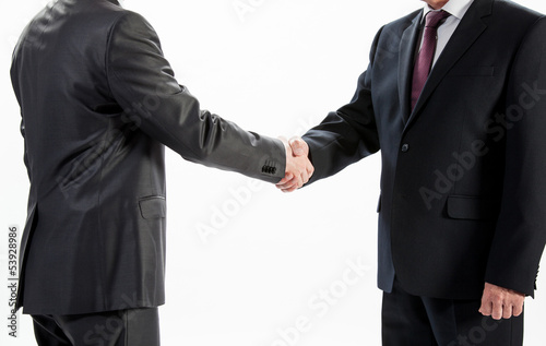 Businessmen shake hands