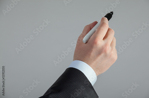 Businessman's hand writing